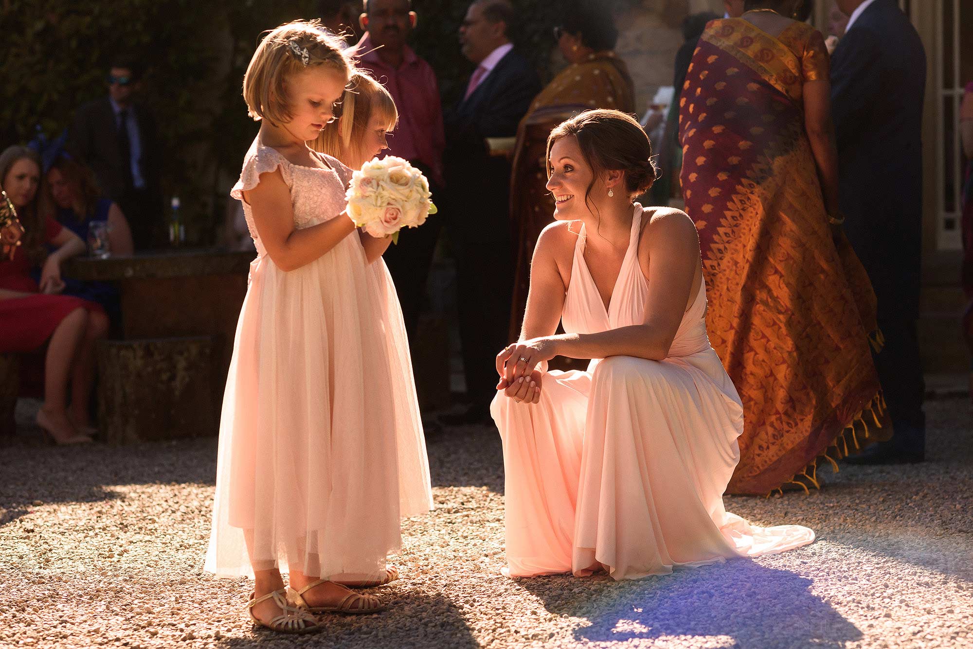 flower girls and bridesmaids outside Mitton Hall