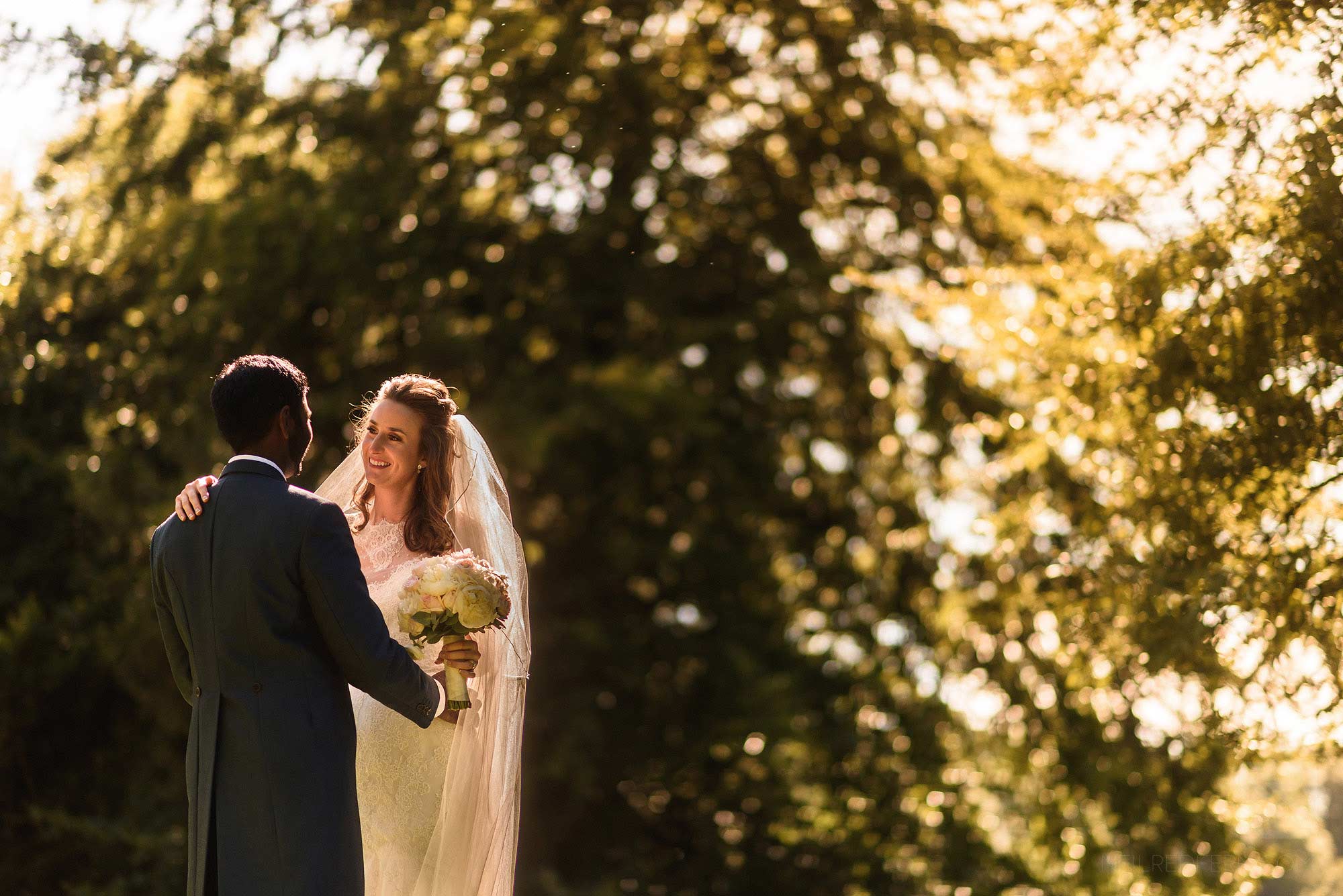 bride and groom portrait outside Mitton Hall in Lancashire