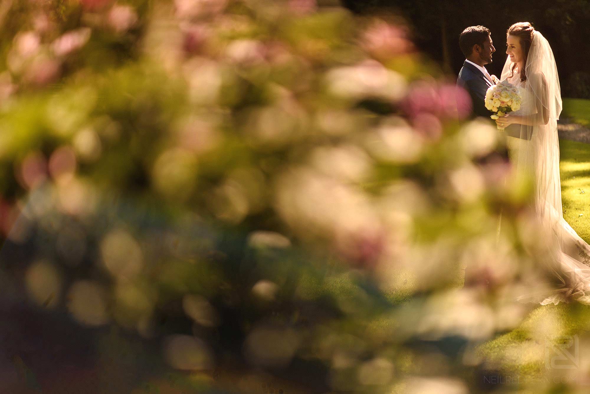 creative wedding photograph of bride and groom at Mitton Hall