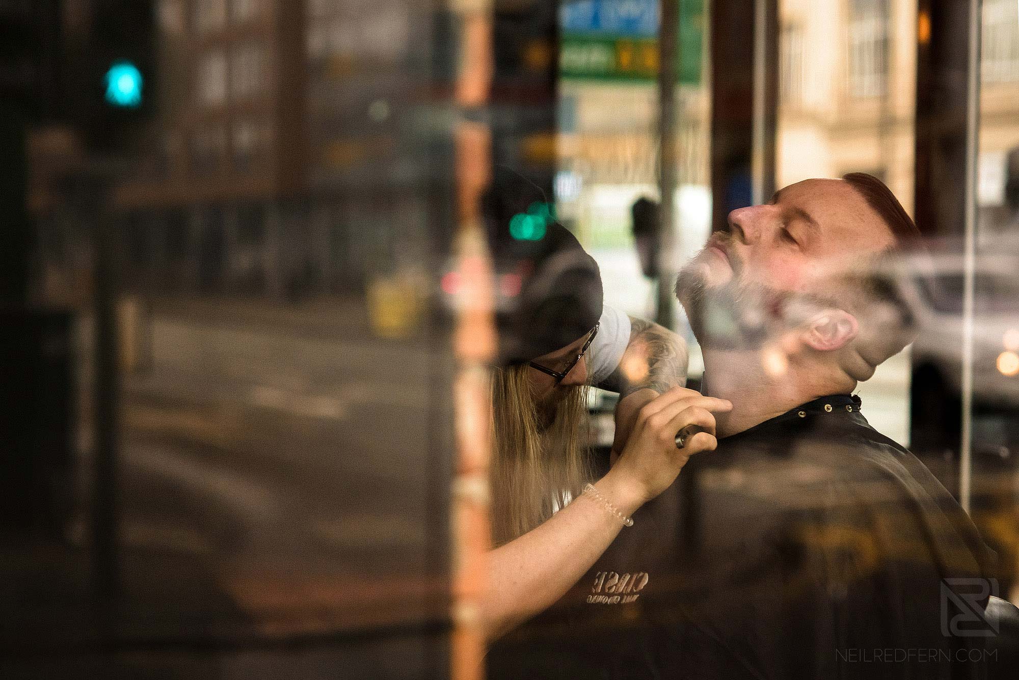 best man having shave on morning of wedding