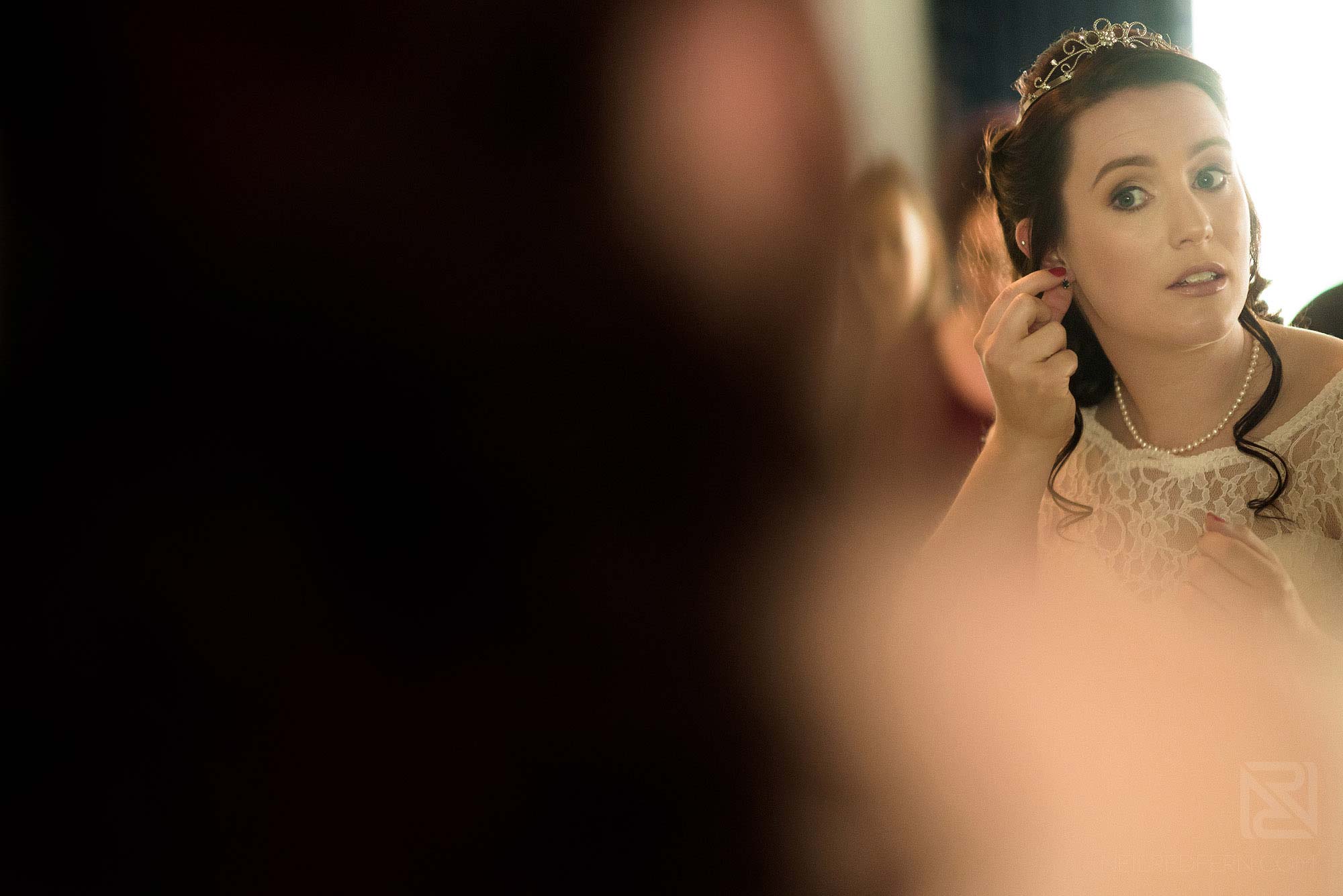 bride getting ready on morning of wedding