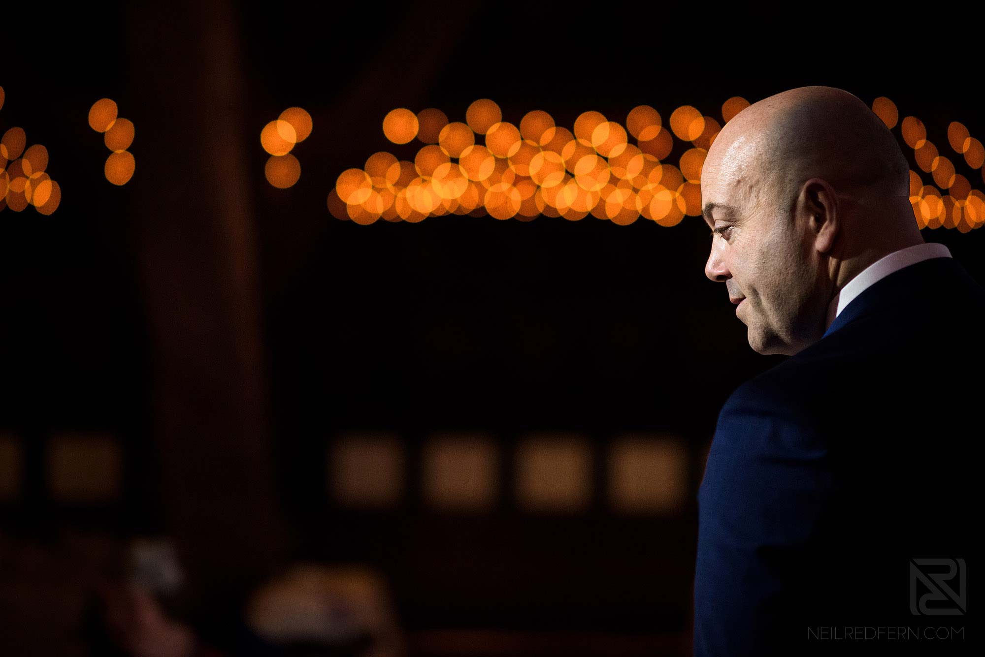groom waiting nervously just before wedding ceremony