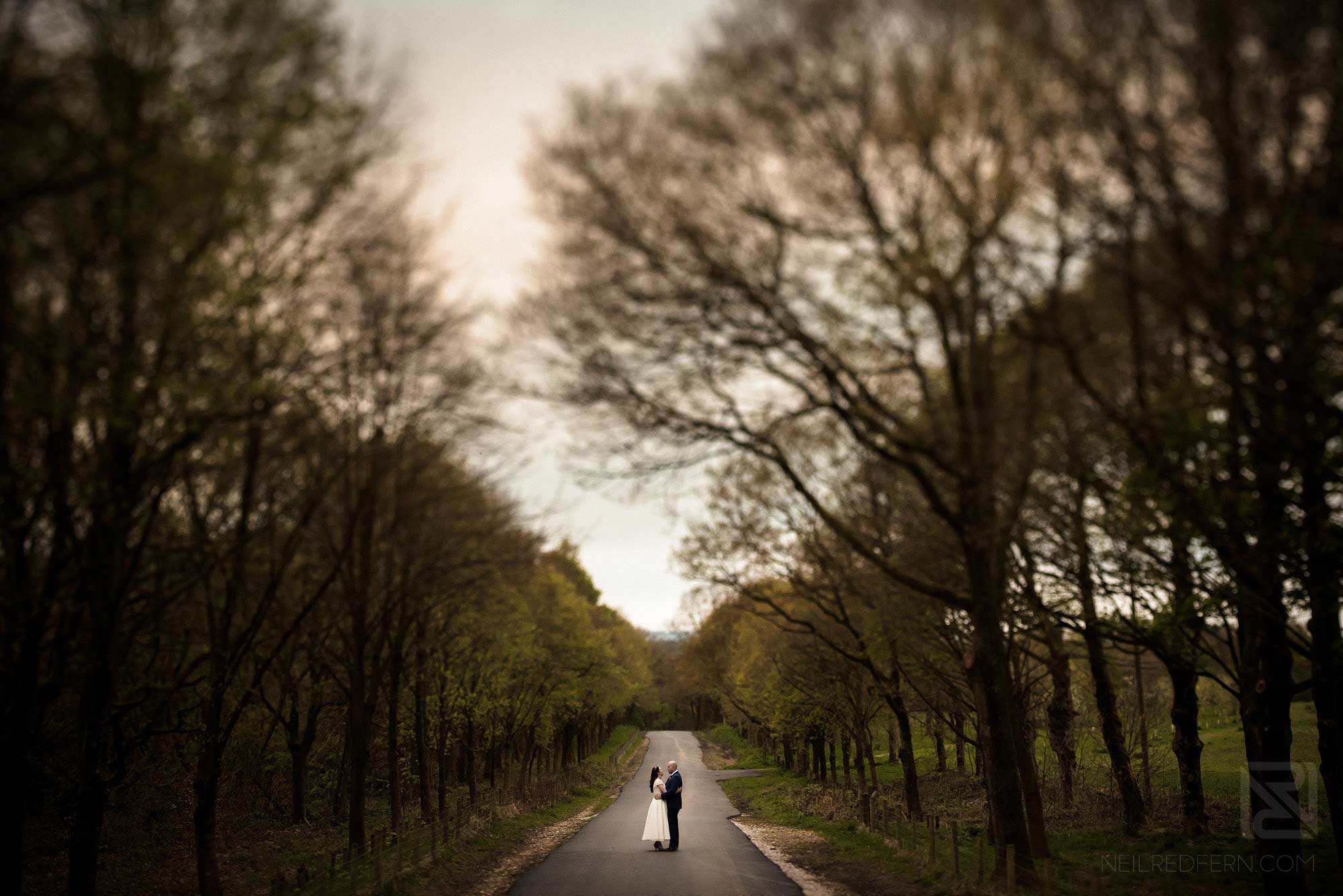 portrait photograph of bride and groom outside Rivington Hall Barn