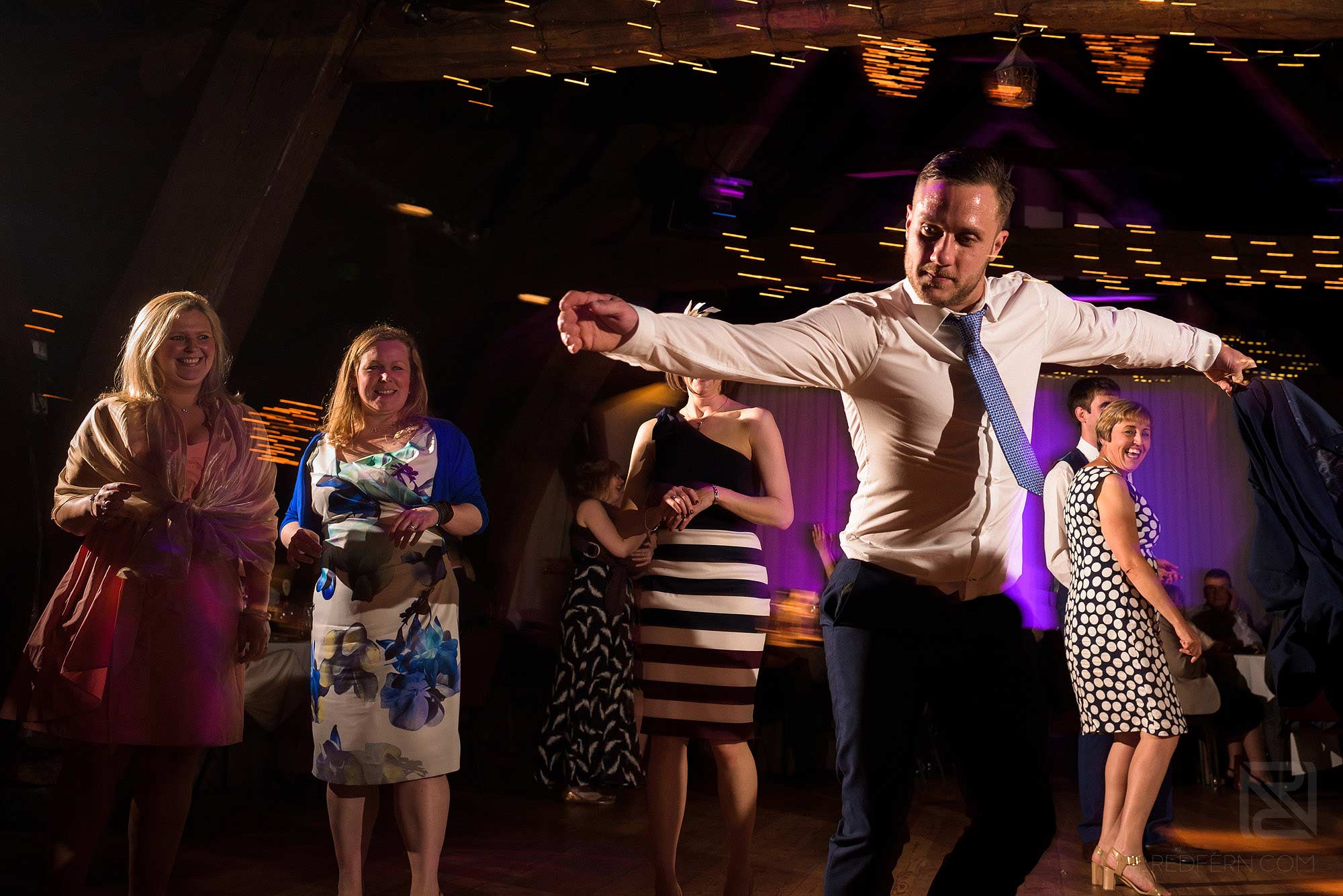 guests dancing during wedding reception