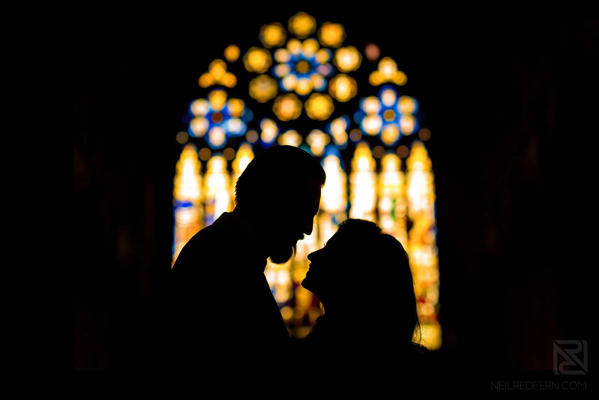 silhouette photograph of couple inside St Albans Cathedral