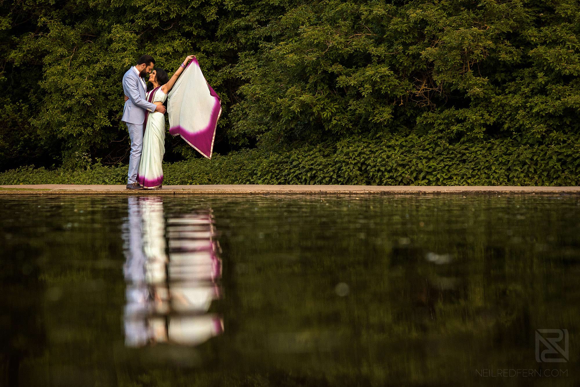 Hindu engagement shoot photograph by lake