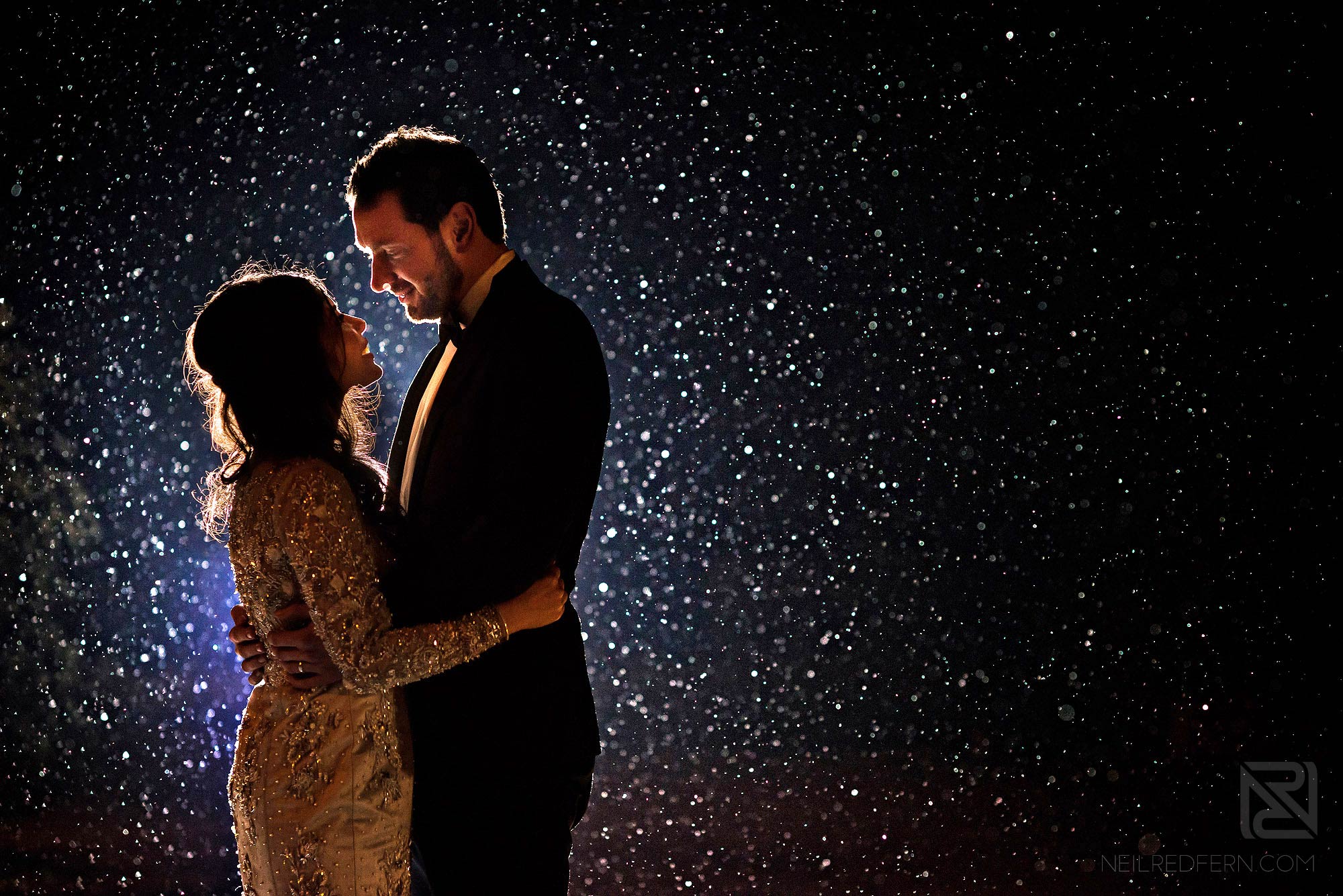 Arley Hall wedding photography 5 bride and groom in the rain outside Arley Hall