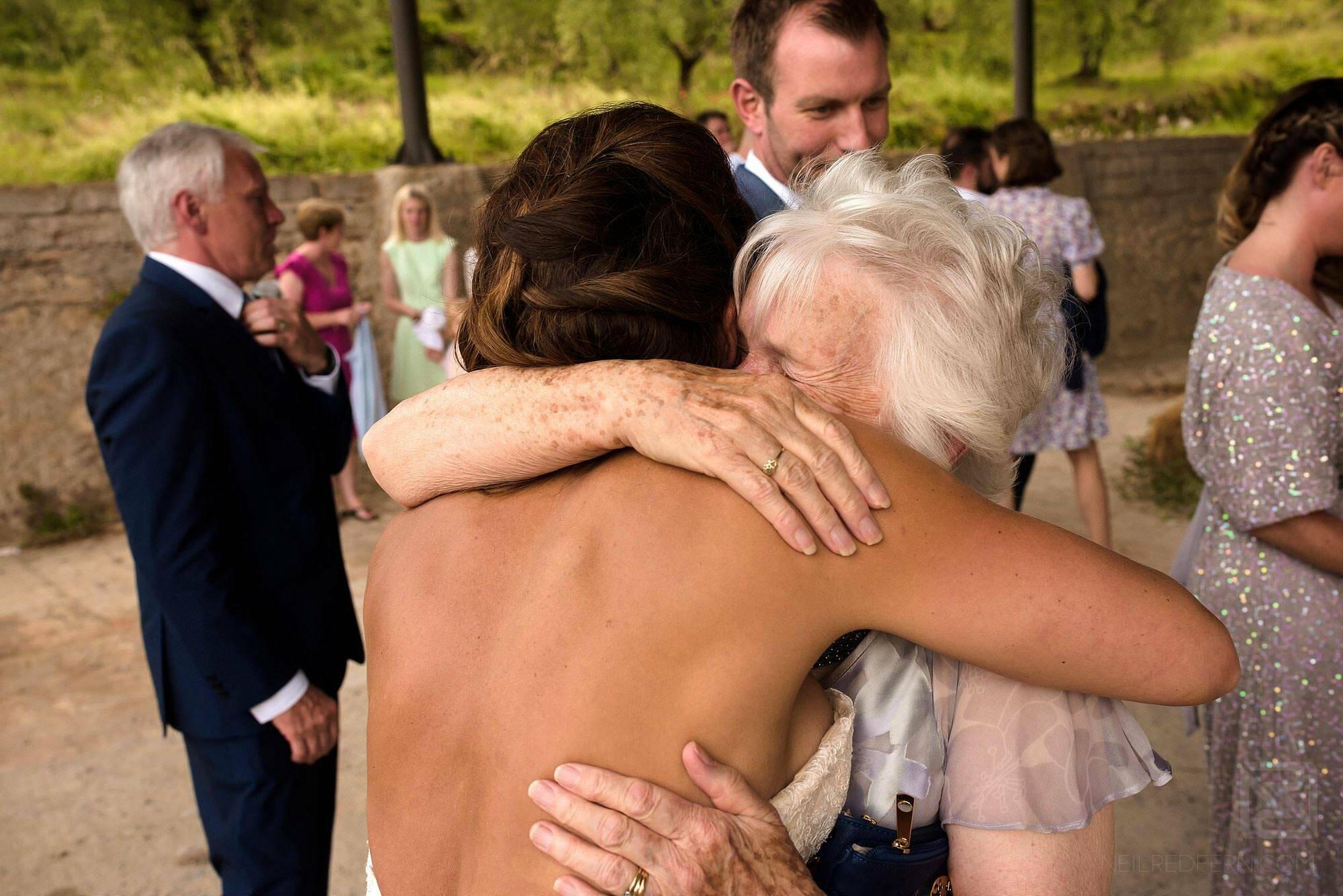 bride hugging grandmother