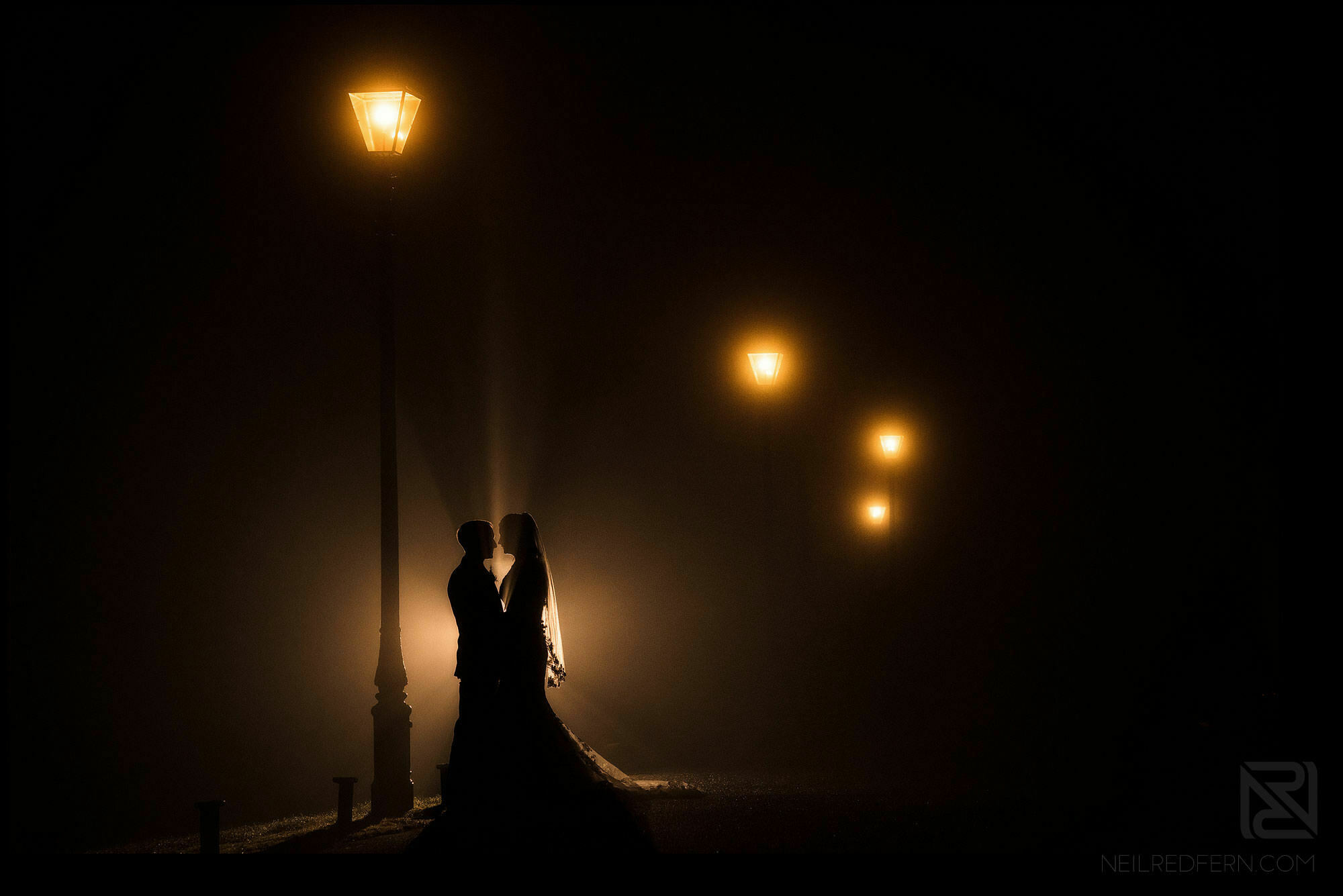 night time bride and groom portrait outside Broadoaks Country House in the Lake District