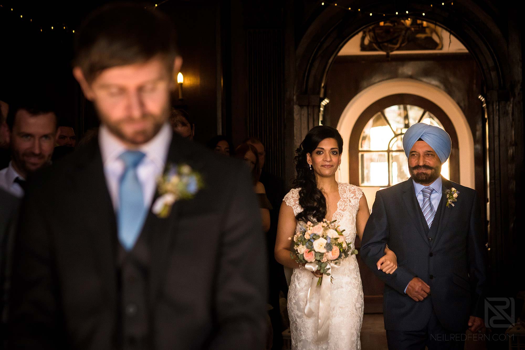 bride walking down the aisle in Portmeirion