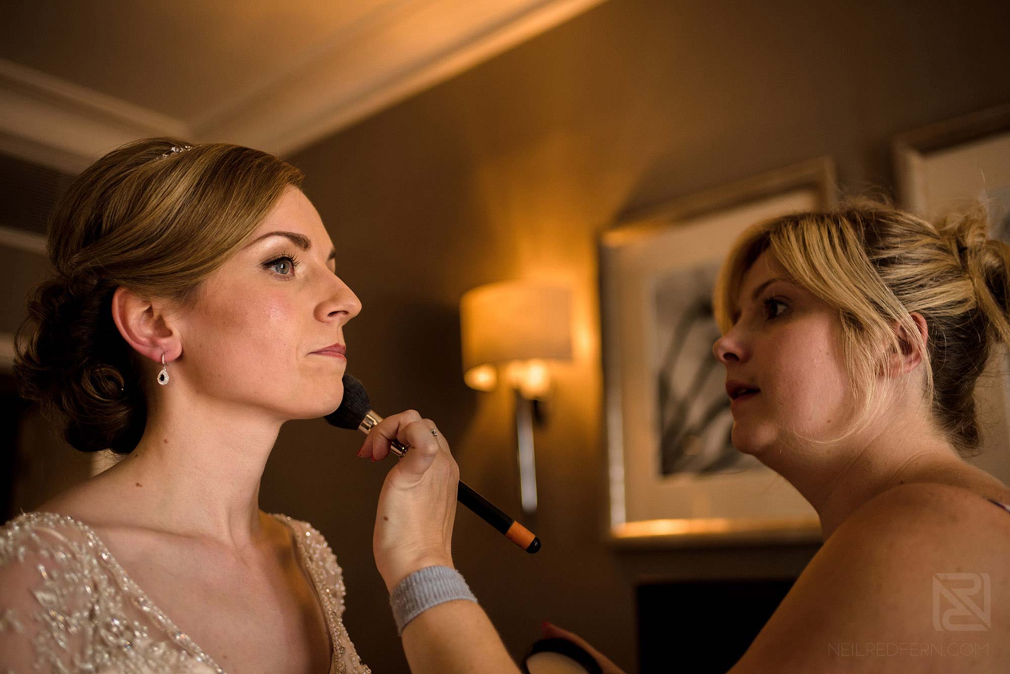 bride getting ready on morning of wedding