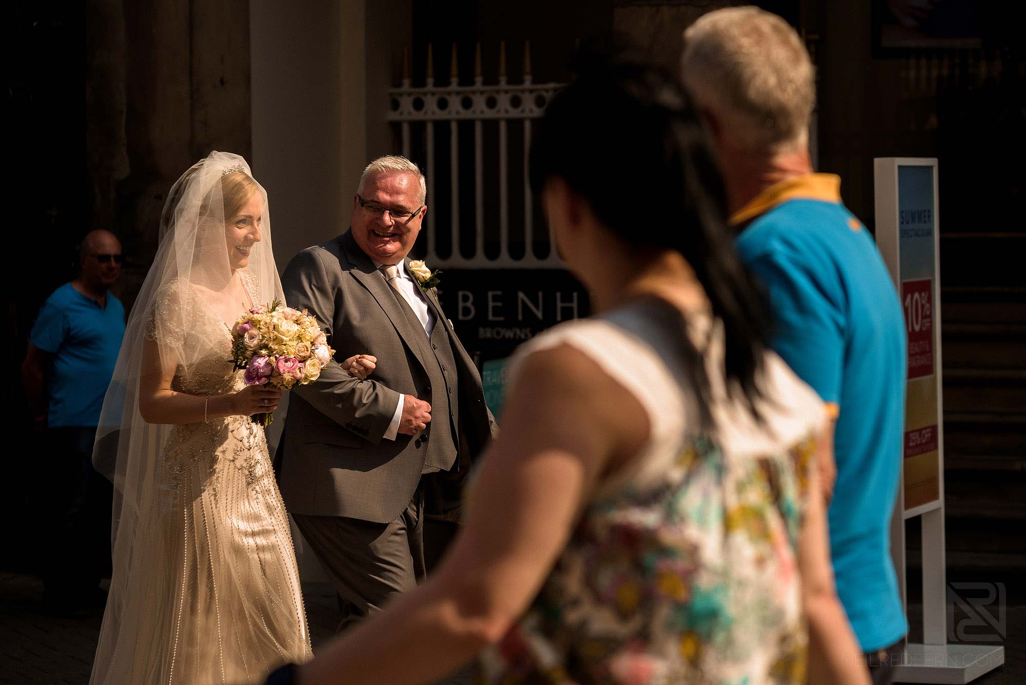bride and father walking through Chester to Church