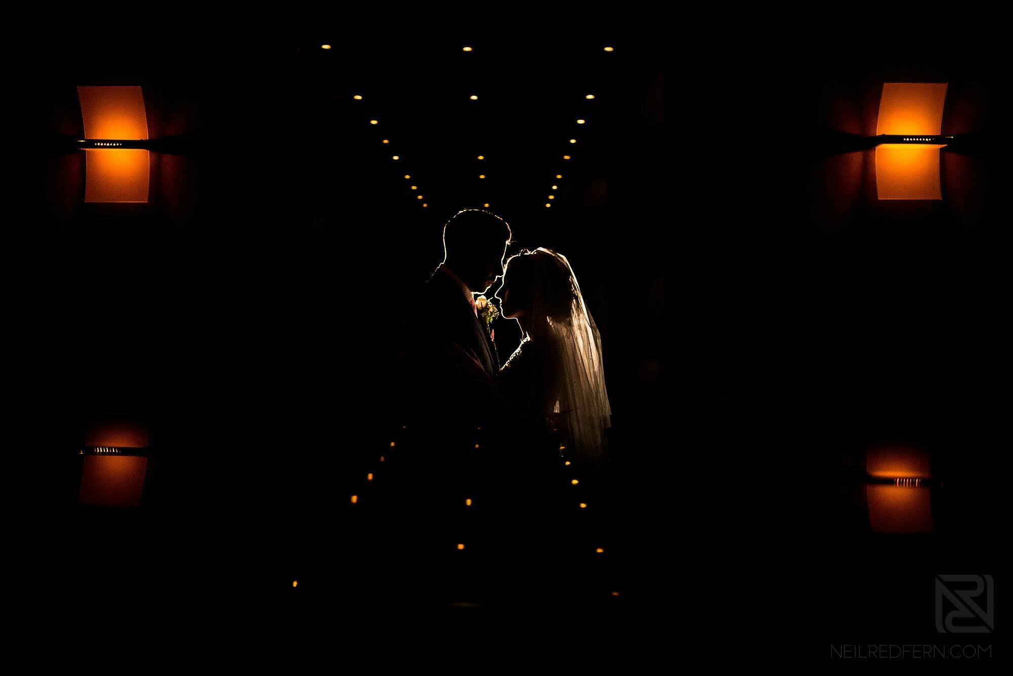 creative off camera flash portrait of bride and groom in Chester Grosvenor