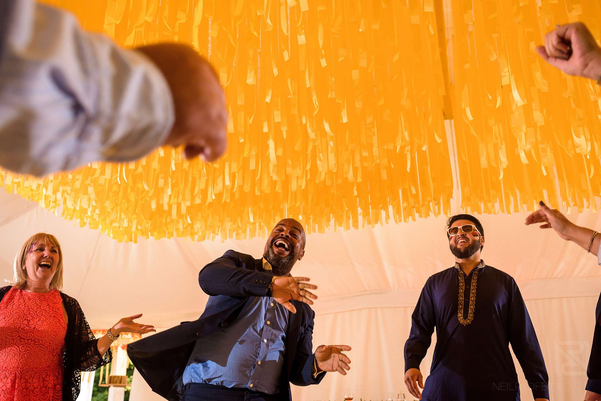 guests dancing at Haldi ceremony
