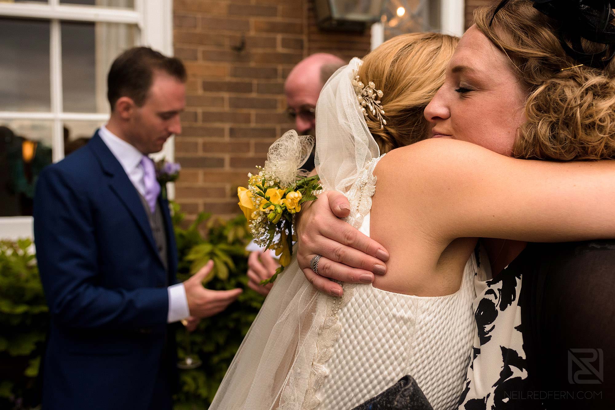 friend congratulating bride
