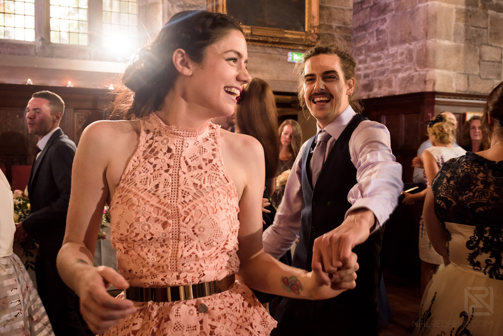 wedding guests dancing at Hoghton Tower