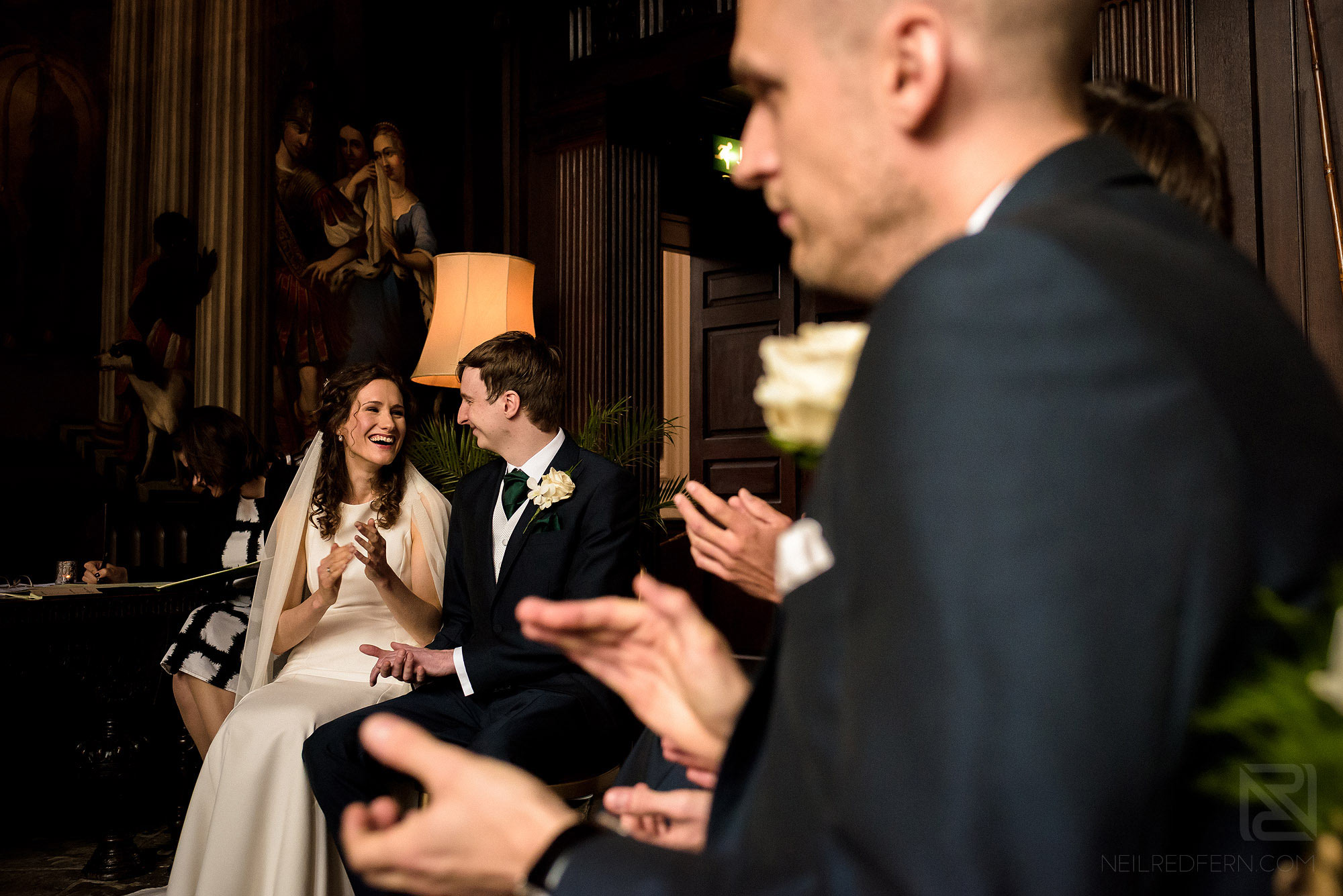 couple looking at each other during wedding ceremony