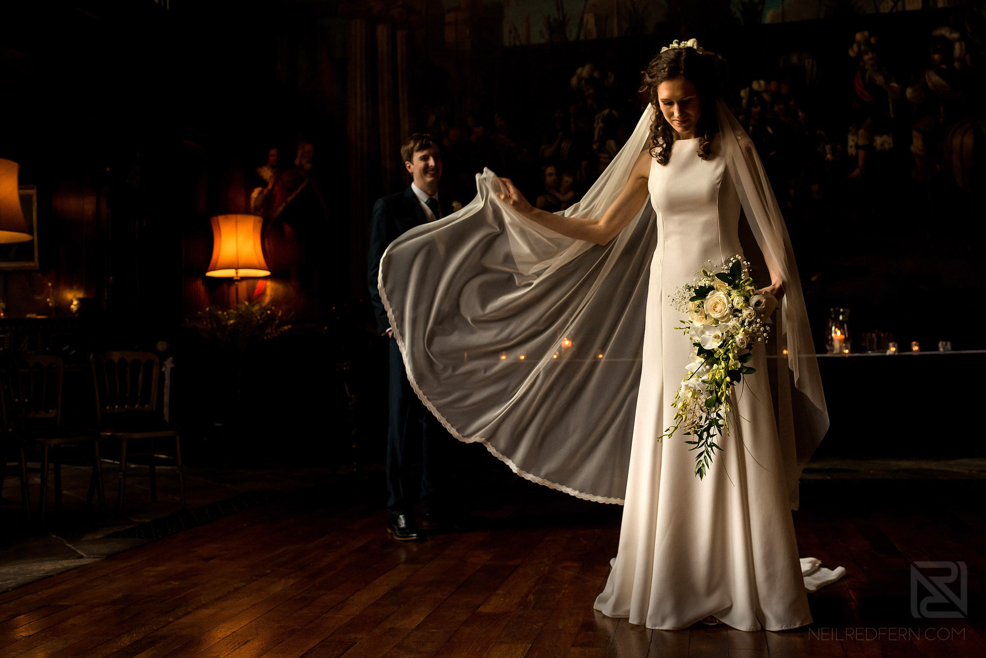creative photograph of bride and groom inside Adlington Hall in Cheshire