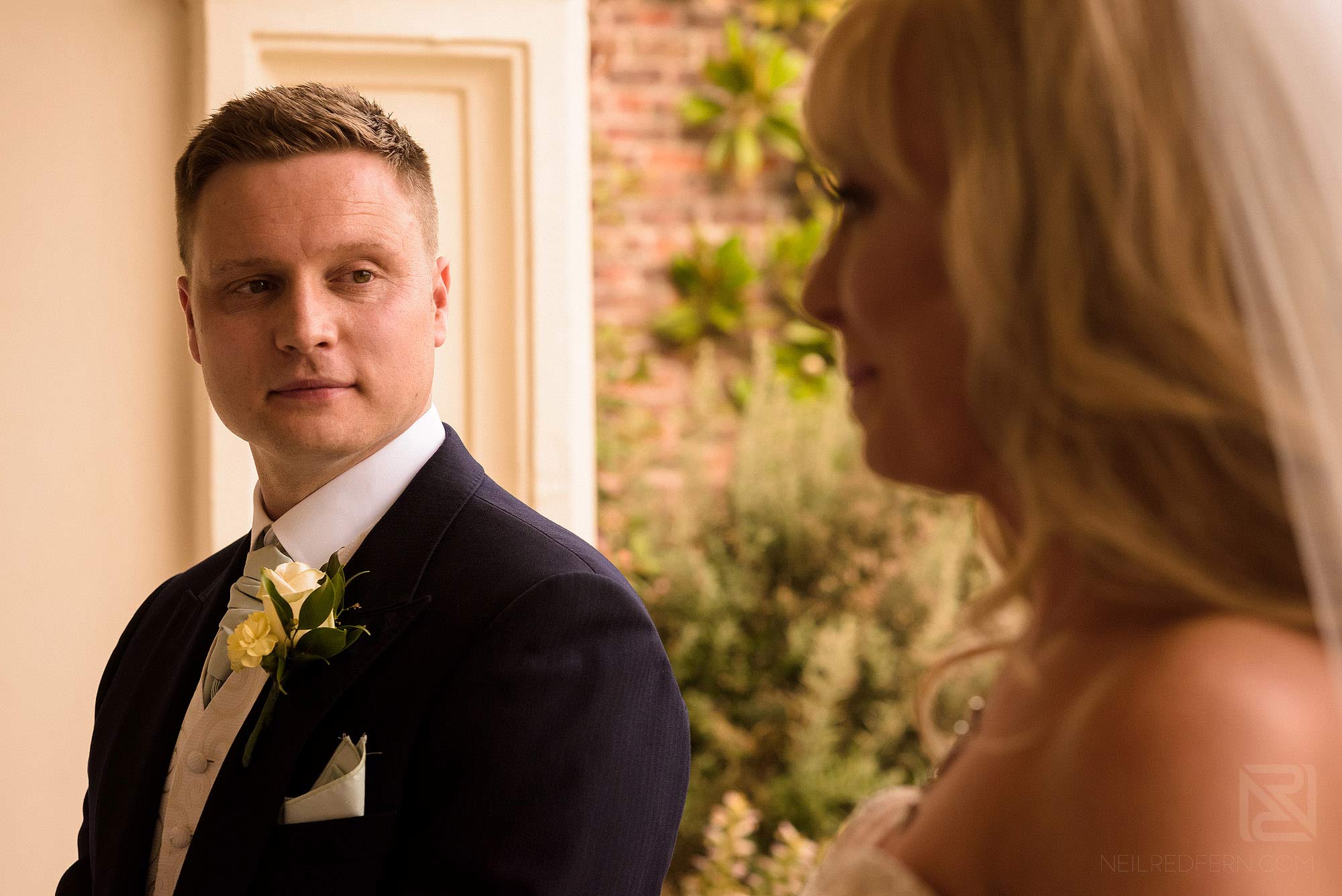 Summer wedding at Arley Hall 15 emotional groom looking at bride