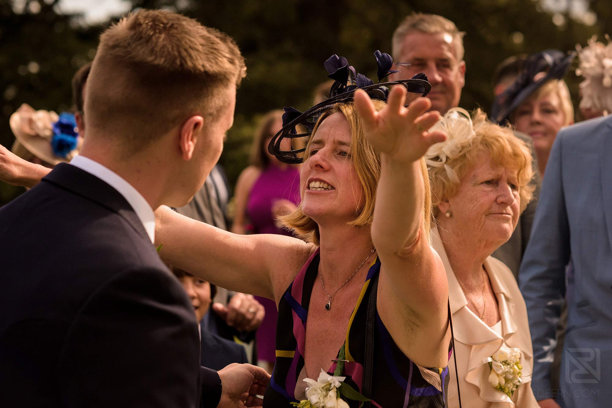 Summer wedding at Arley Hall 21 wedding guest hugging groom