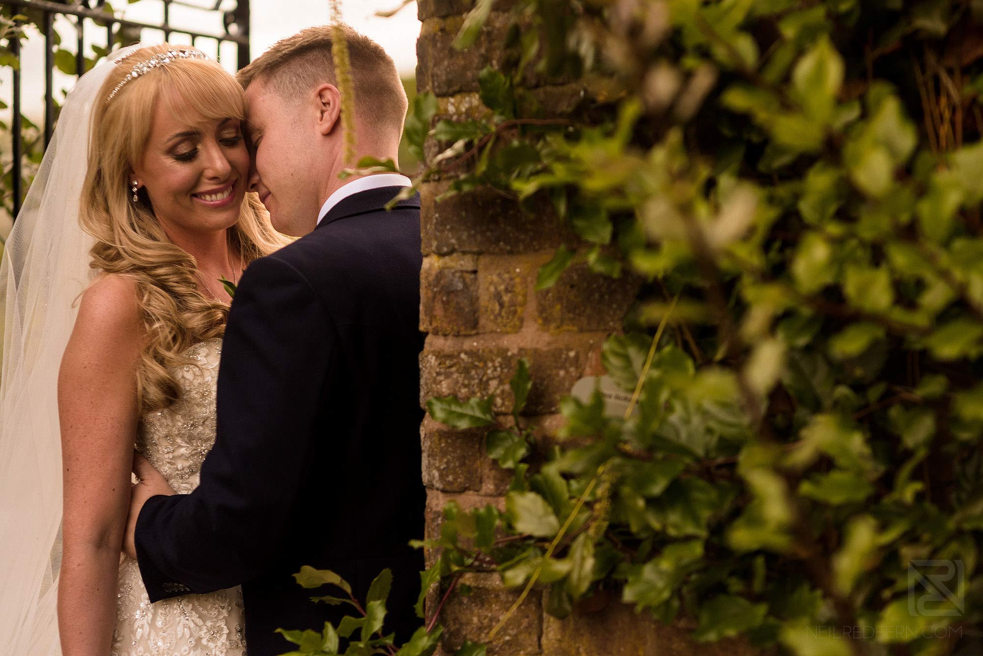 romantic photograph of bride and groom at Arley Hall