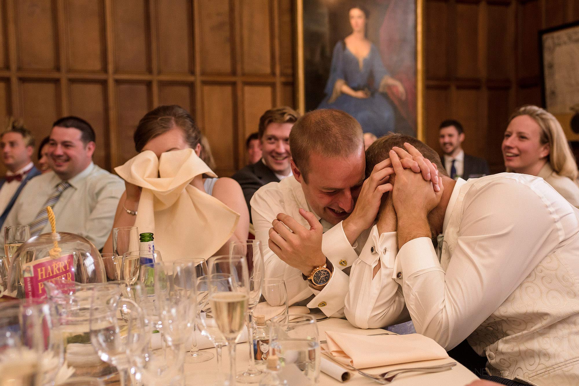 Summer wedding at Arley Hall 36 wedding guests laughing during speeches