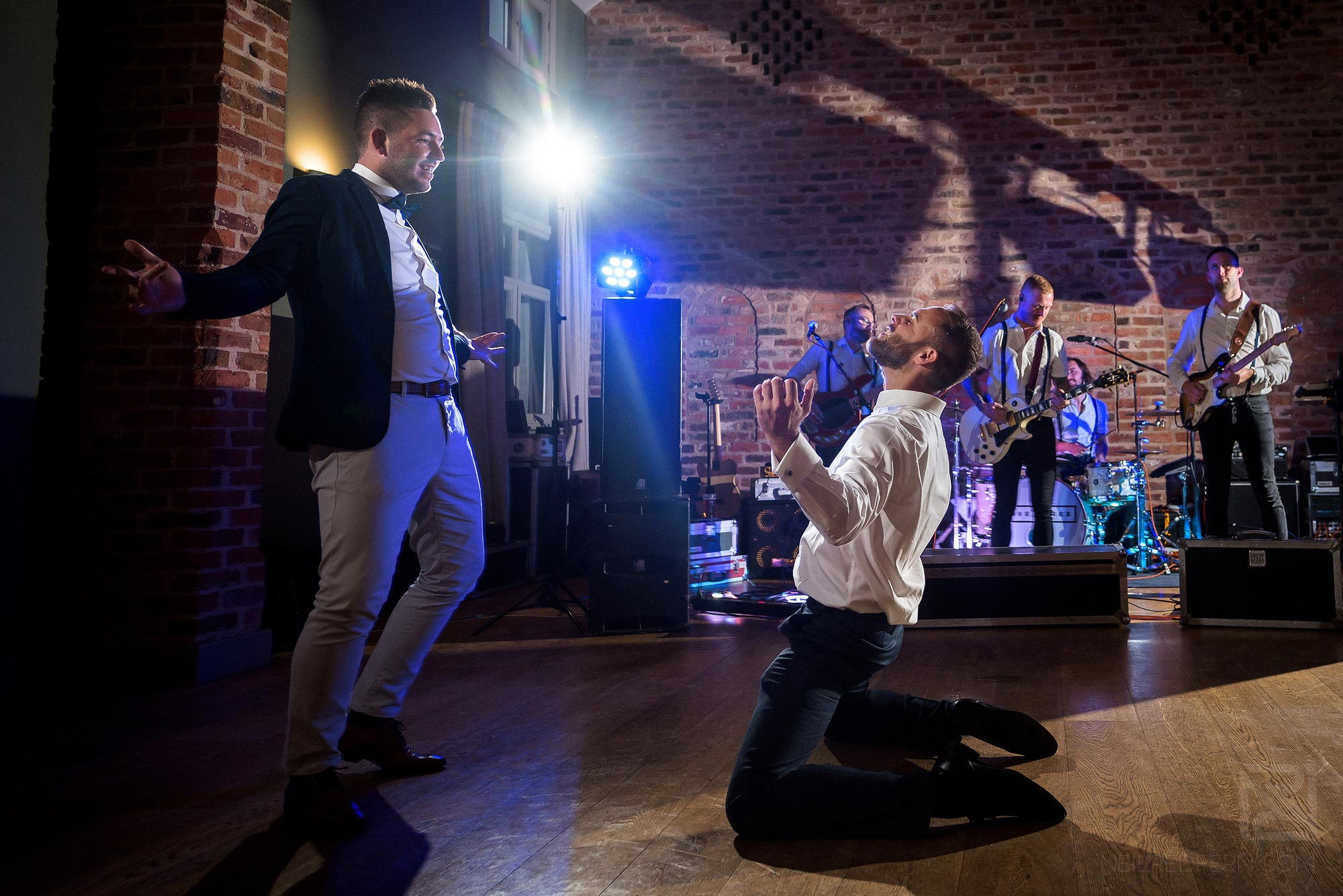 Summer wedding at Arley Hall 47 wedding guests dancing during reception at Arley Hall Olympia Suite