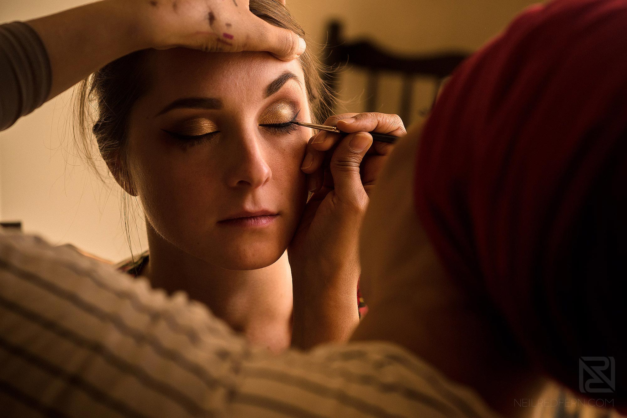 bride getting ready at home on morning of wedding