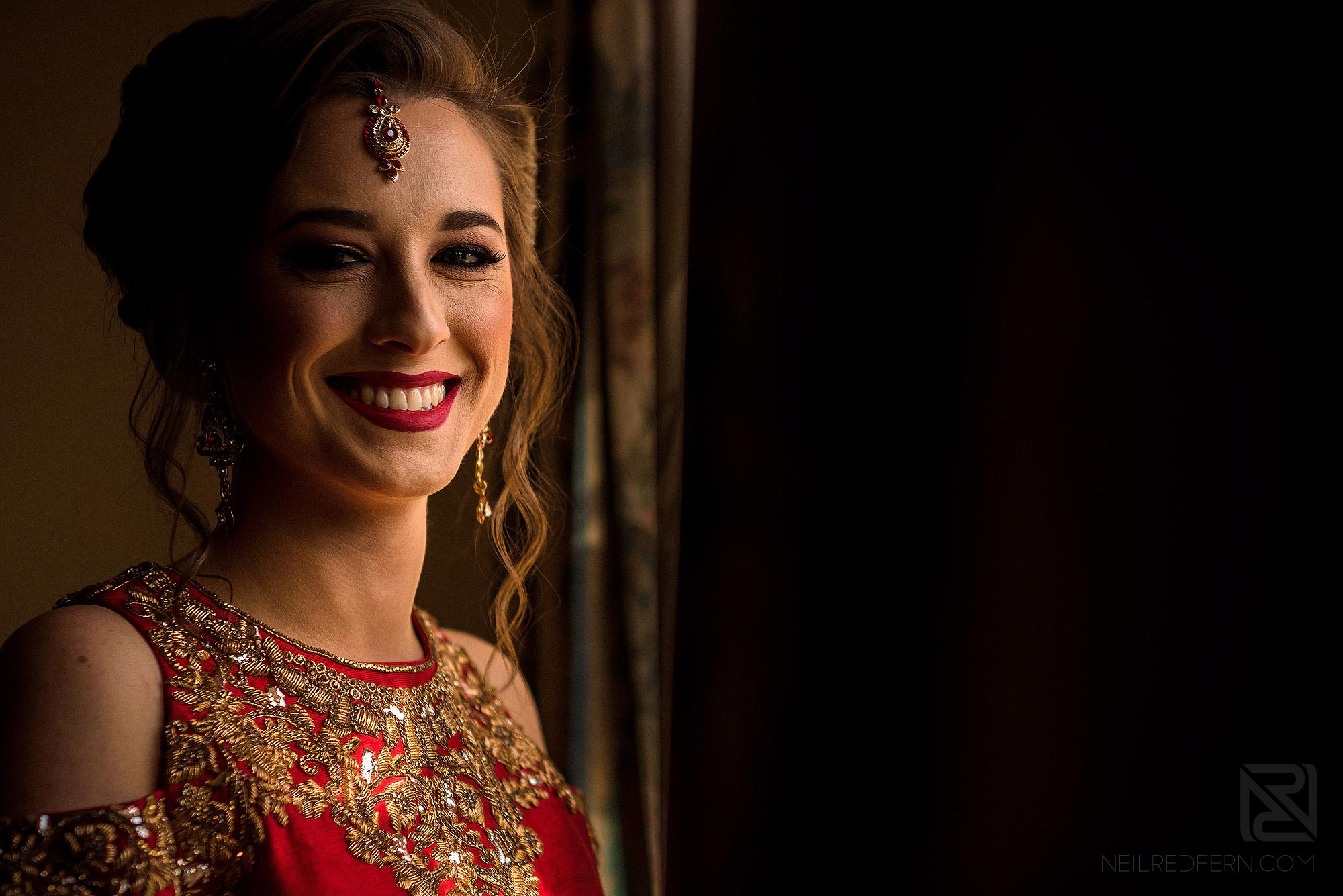 beautiful window light portrait of Indian bride