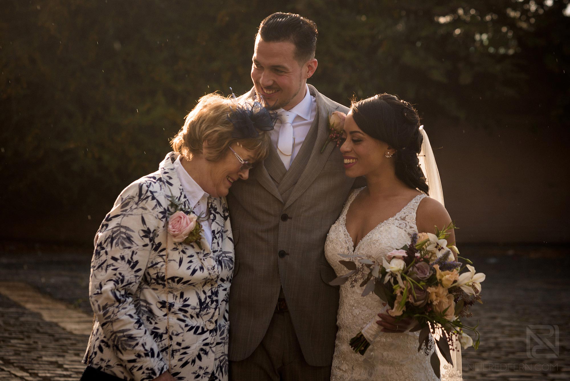 family photograph outside Shakespere's Globe in London