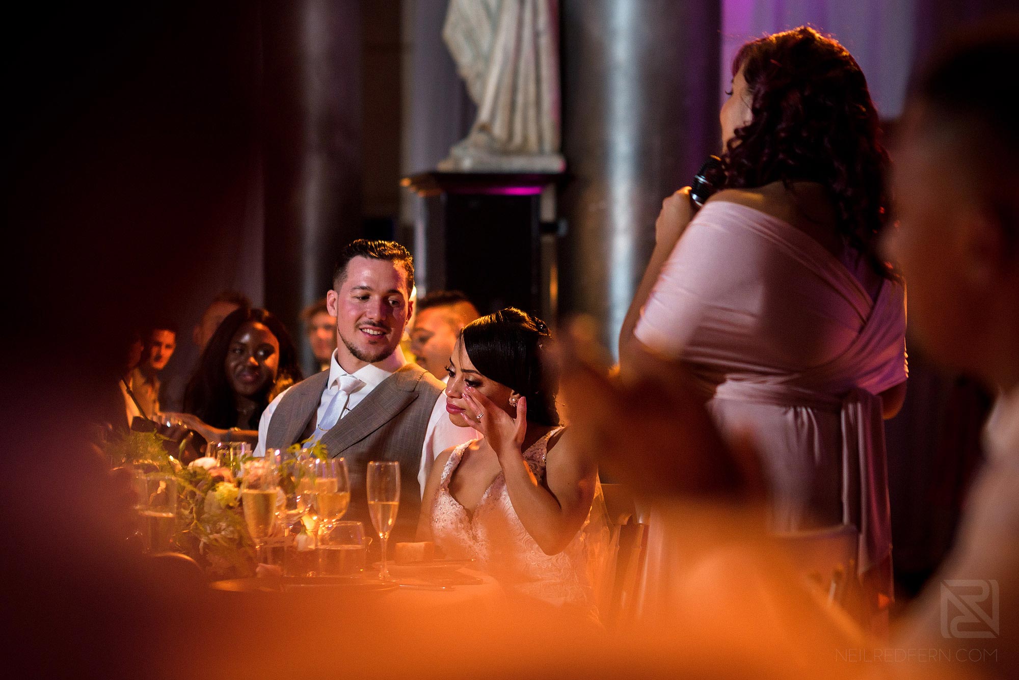 emotional bride crying during wedding speeches