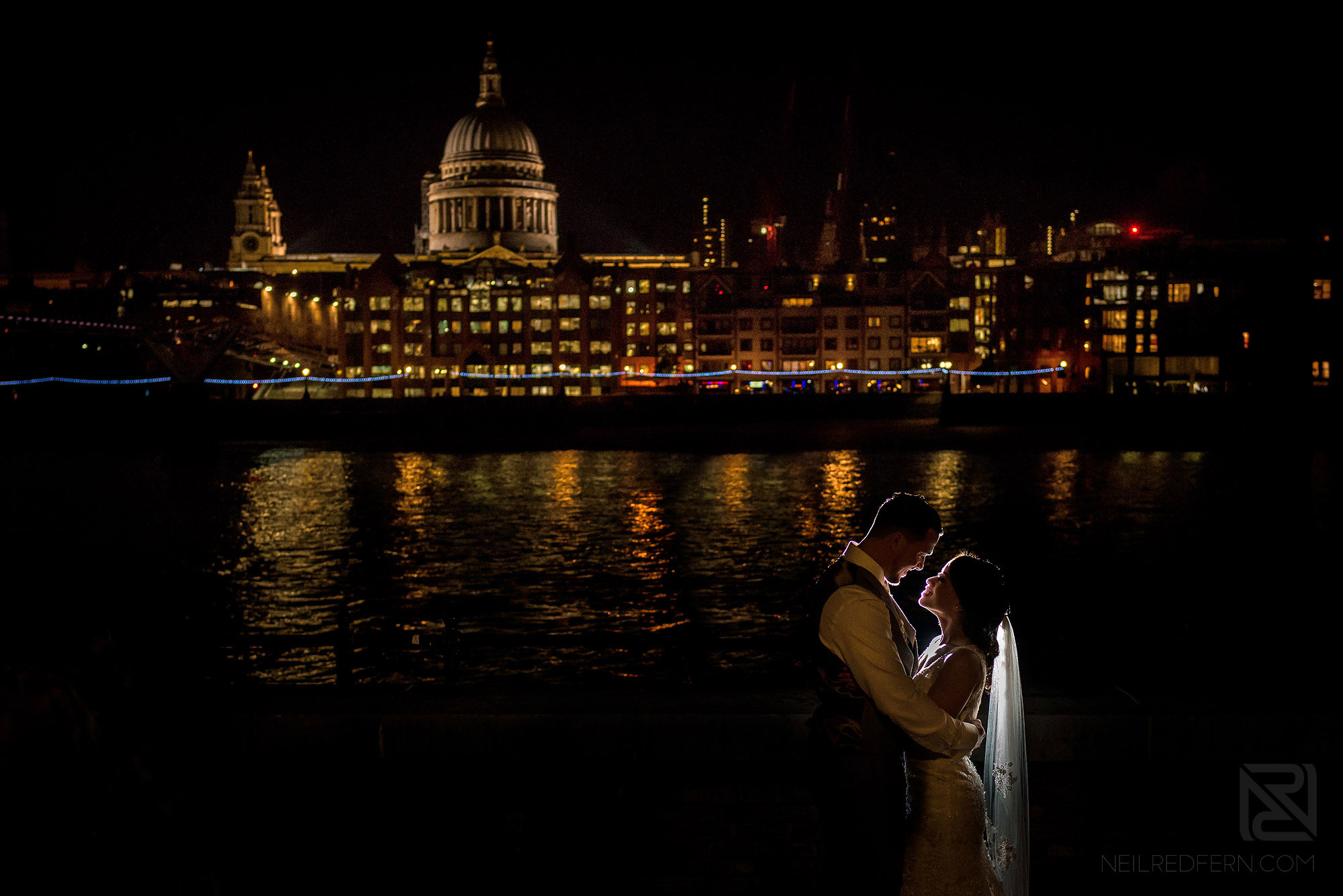 beautiful photograph of bride and groom outside St Paul's Cathedral