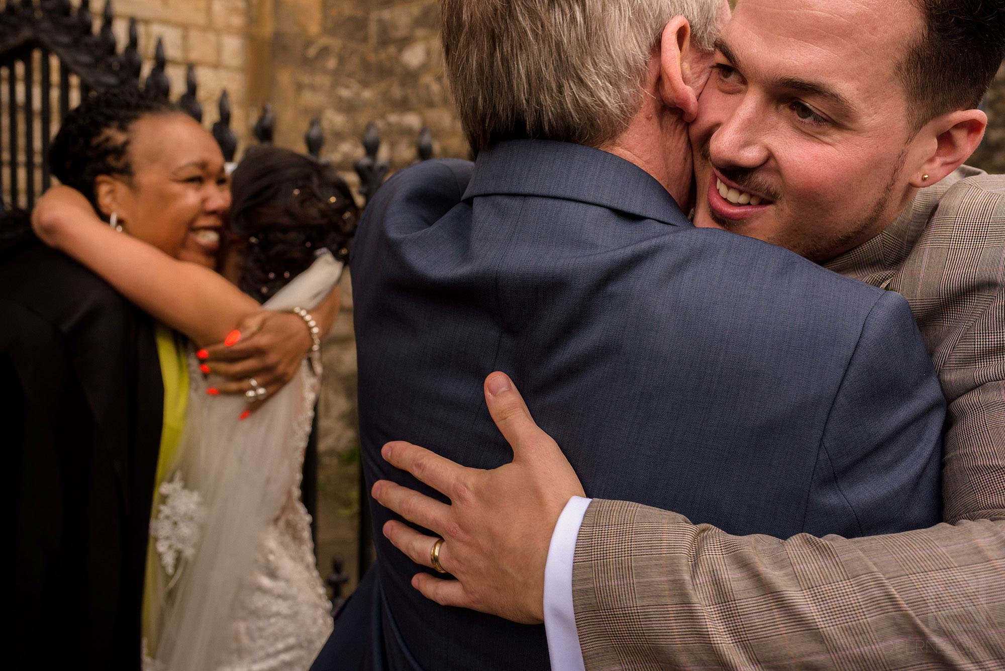 happy hugs after wedding ceremony