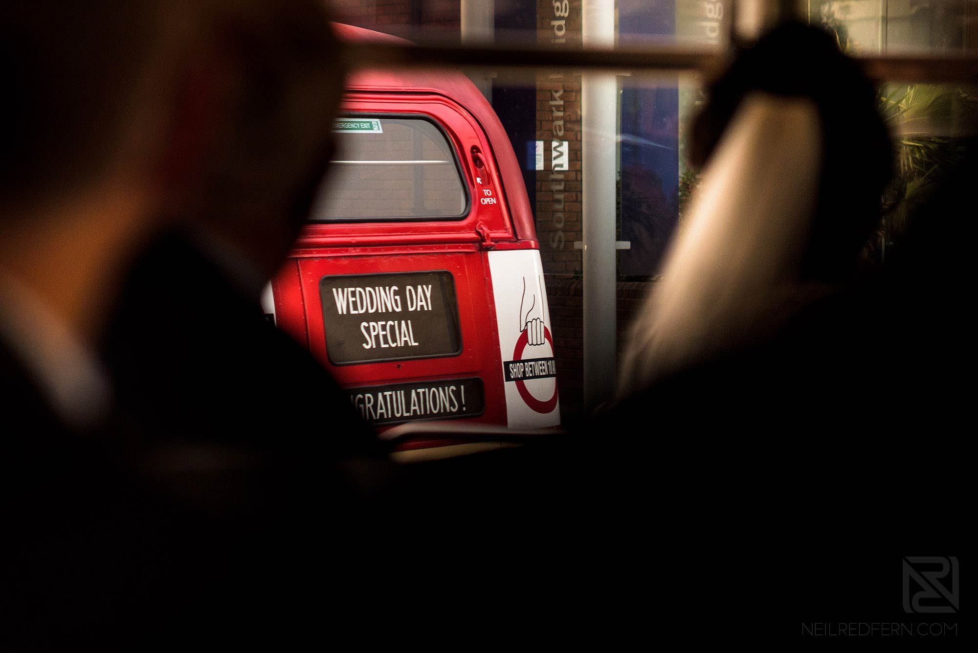 bride on London wedding bus