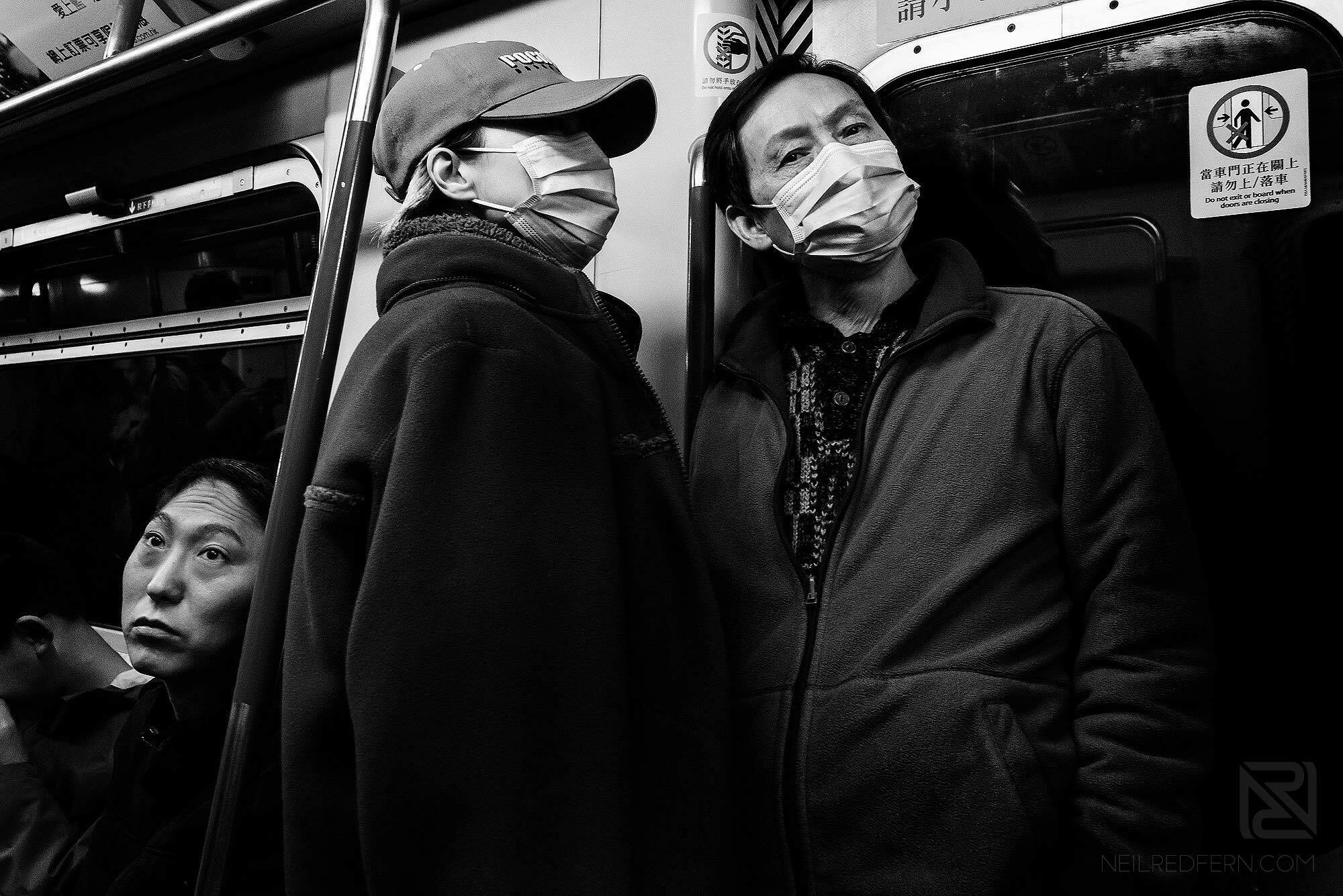 Hong Kong Travel Photography 22 two men traveling on MTR