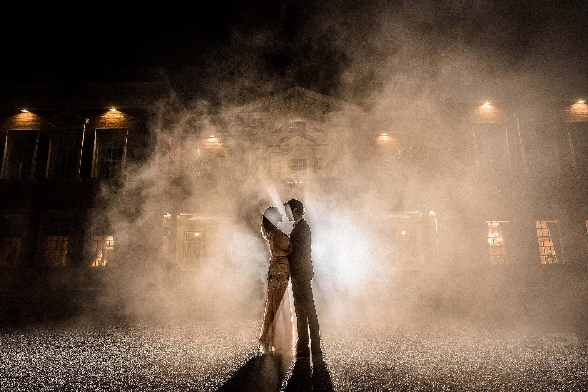 Off camera flash workshops at Eaves Hall 5 photograph of bride and groom using smoke bomb