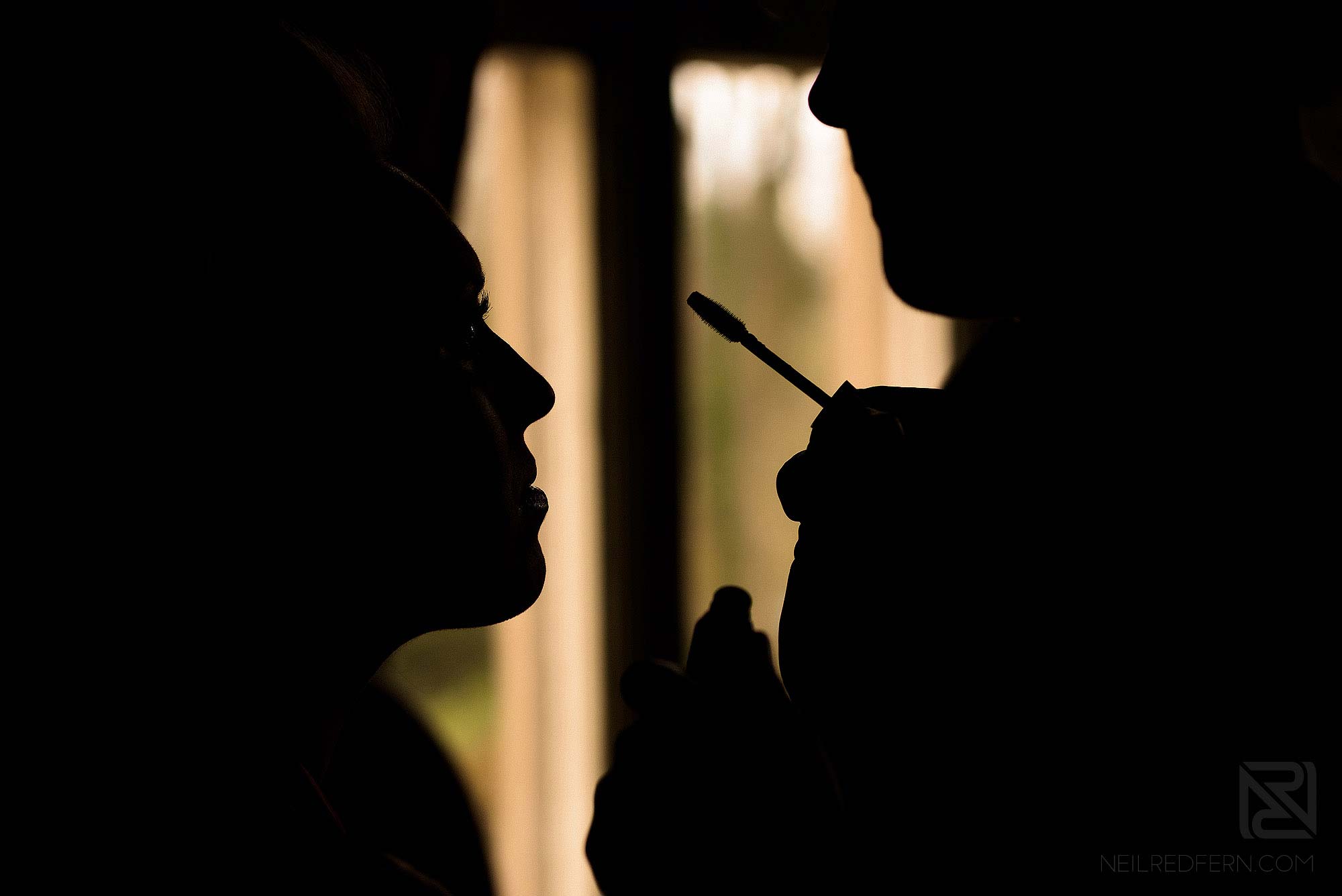 sillouette photograph of wedding make-up
