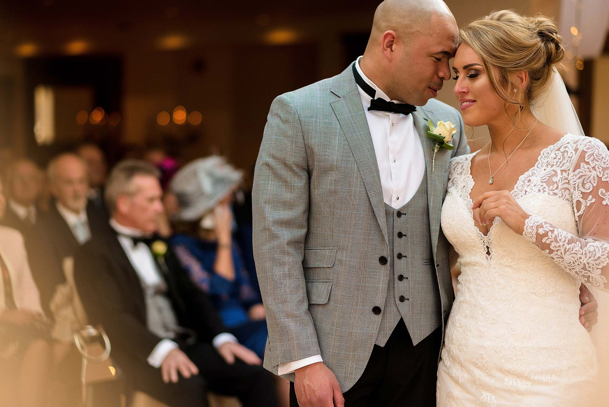 emotional moment between bride and groom during wedding ceremony
