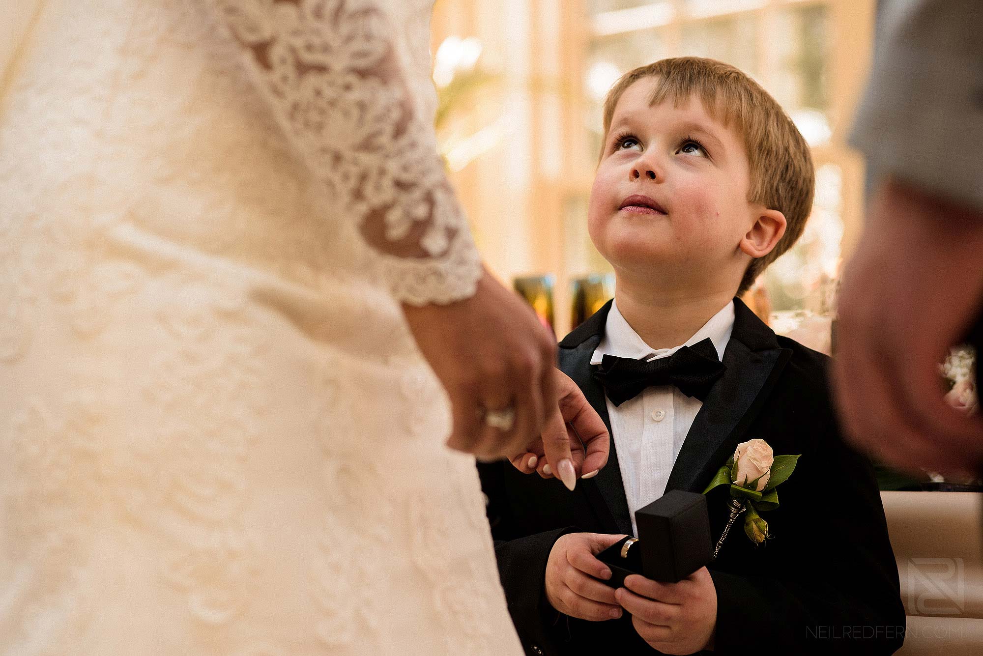 pageboy holding wedding rings