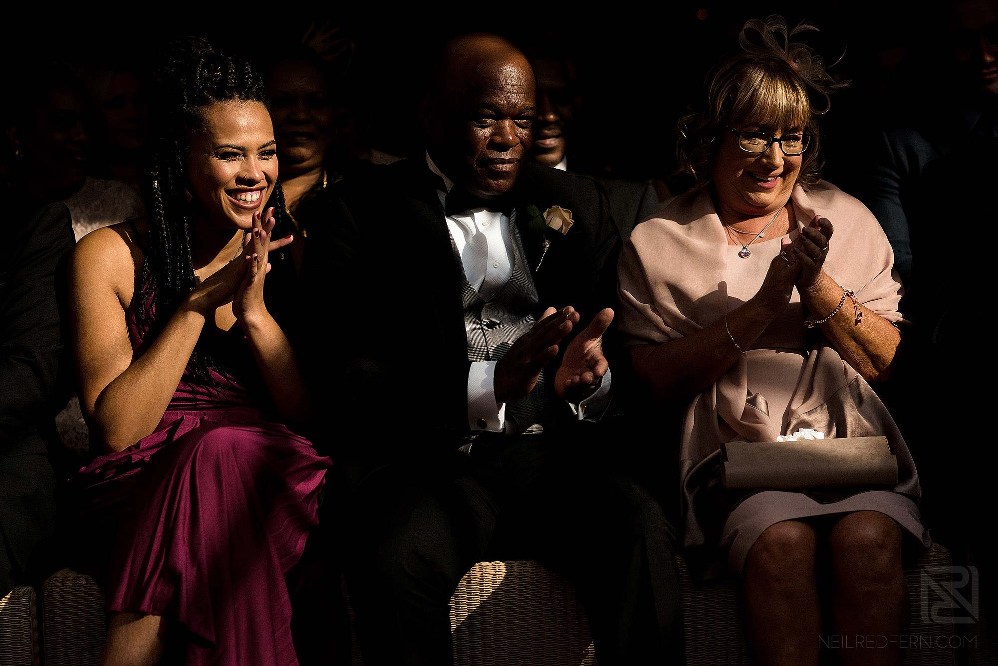 wedding guests clapping