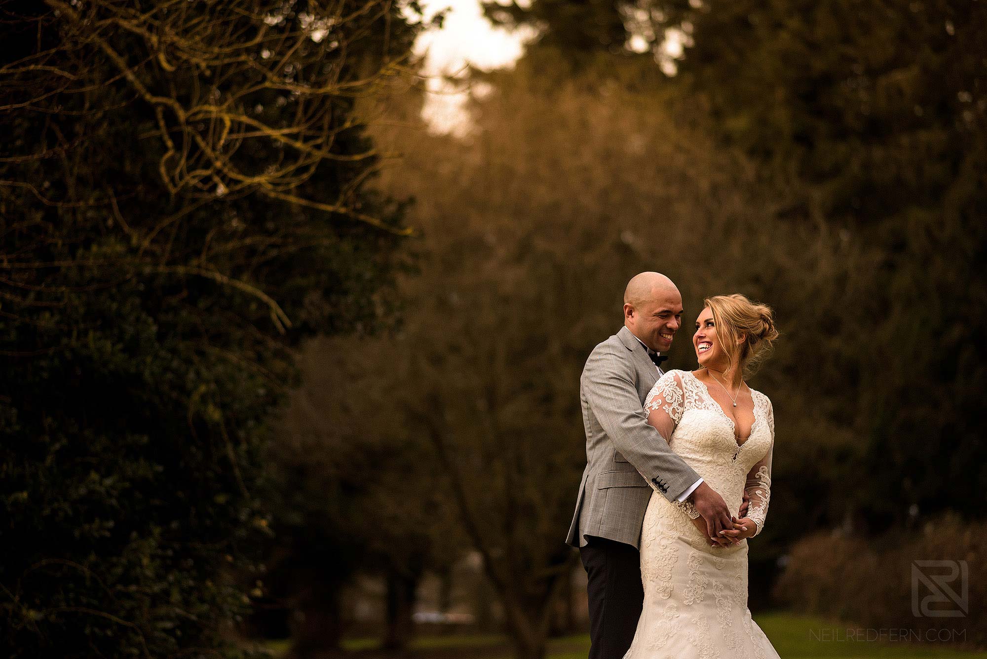 newly married couple looking at each other at Mitton Hall