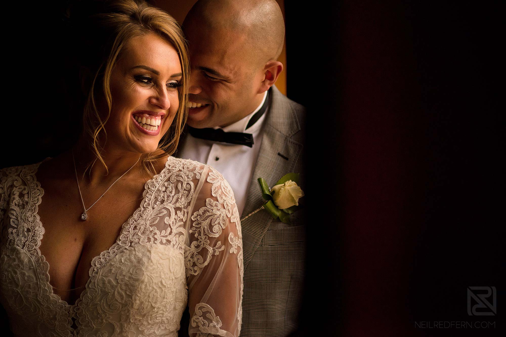 natural light portrait of bride and groom inside Mitton Hall