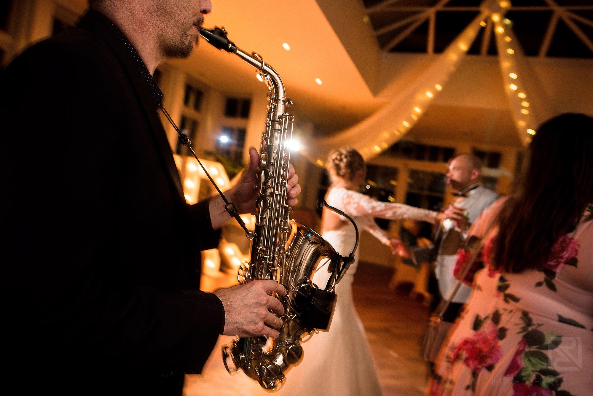 dancing photograph with man playing saxophone