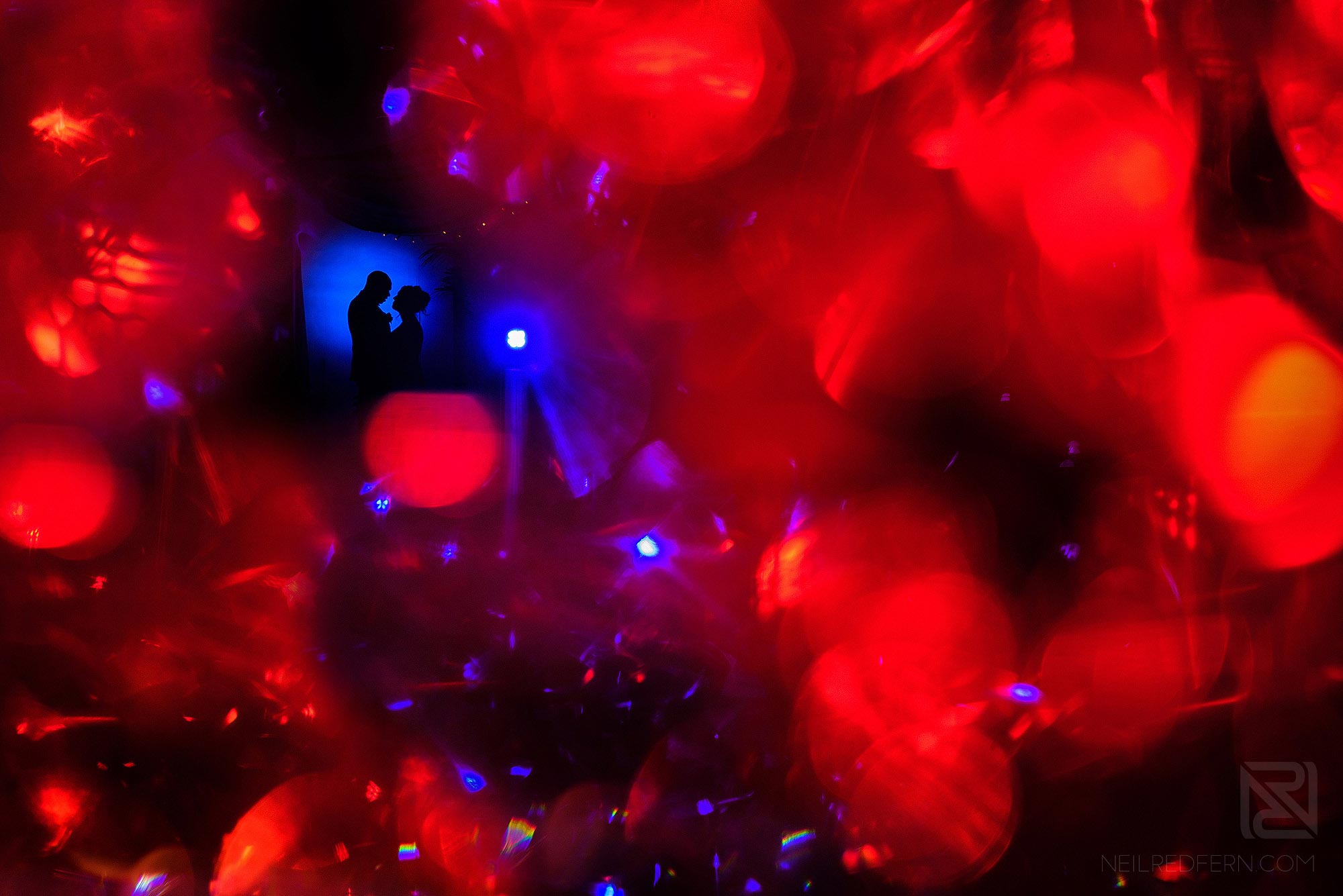 creative off camera flash photo of bride and groom