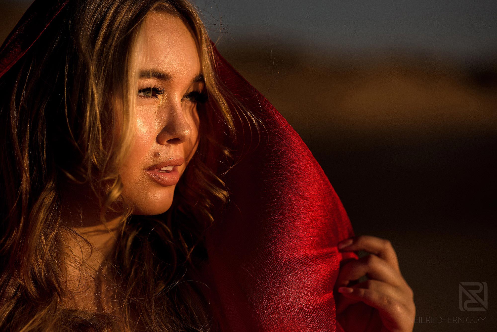 close up portrait of bride on the beach at sunset