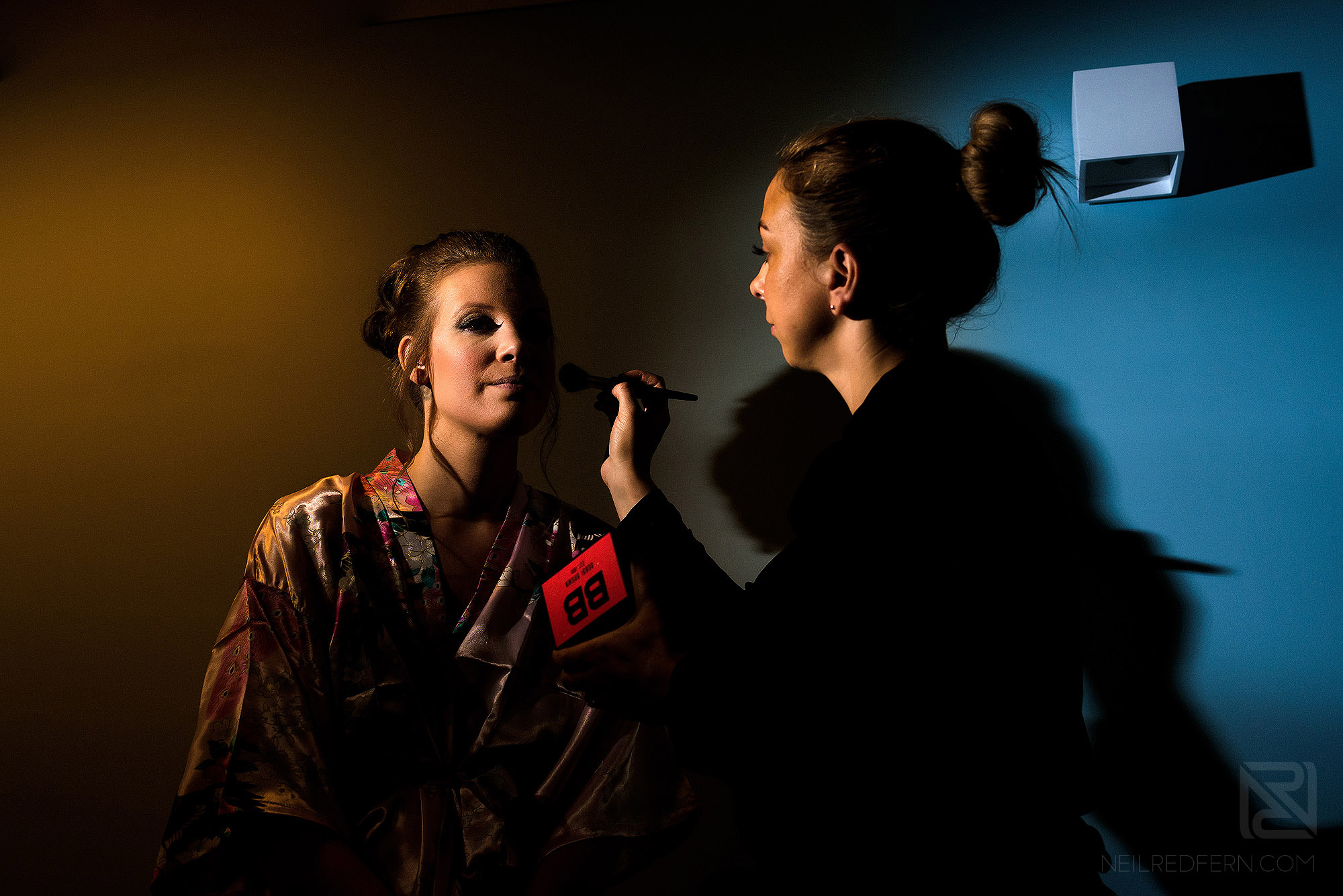 creative photograph of bridesmaid getting ready