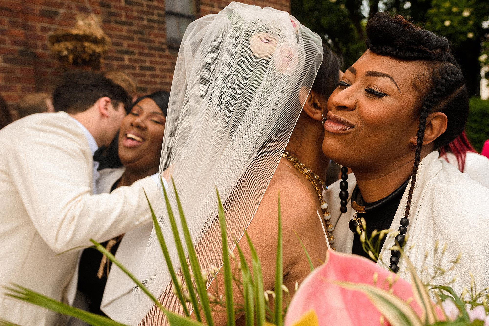 friends of newlyweds giving congratulations