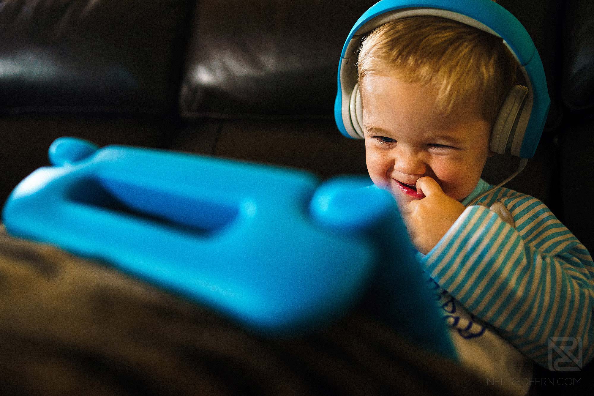 little boy smiling on morning of wedding