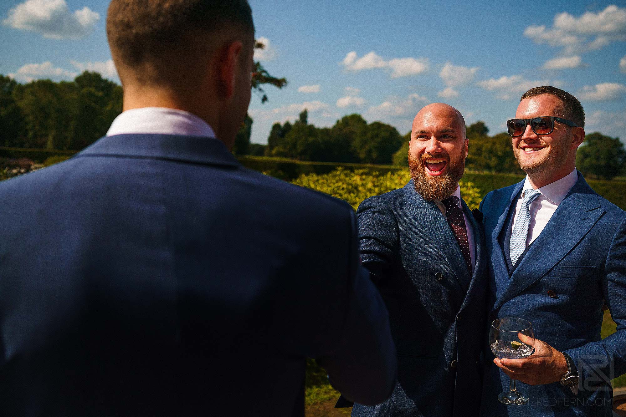 groomsmen laughing
