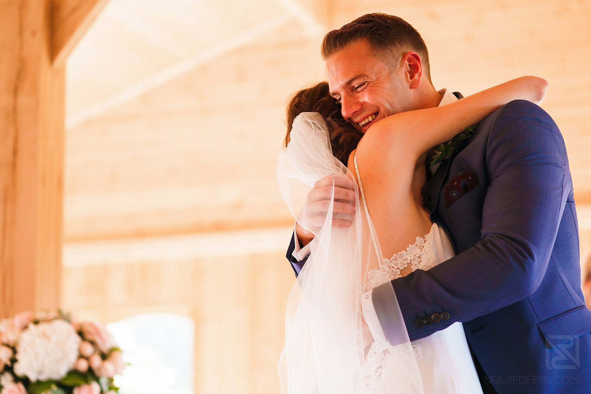 bride and groom hugging during weddingat Merrydale Manor